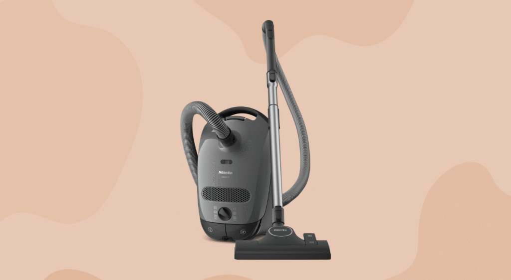 Miele Classic C1 canister vacuum with beige background